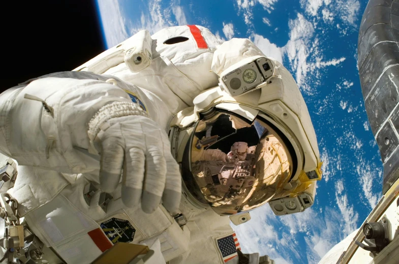 a close up of a person in a space suit, pexels contest winner, blue sky, credit nasa, panels, high tech spaceships