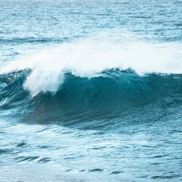 a man riding a wave on top of a surfboard, pexels contest winner, hurufiyya, blue crashing waves, slightly pixelated, aquamarine, sound wave