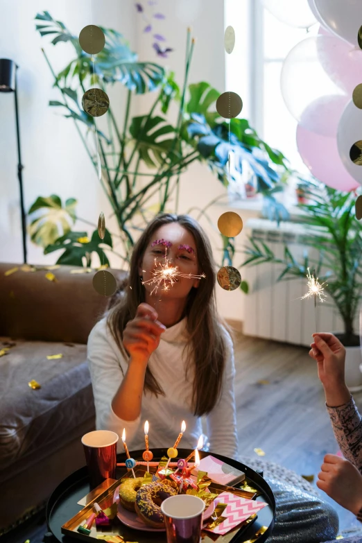 a woman blowing out candles on a birthday cake, pexels contest winner, figuration libre, decoration around the room, smoking a magical bong, promo image, anna nikonova