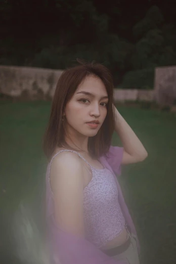a woman in a purple dress posing for a picture, a picture, trending on pexels, realism, pastel faded effect, asian girl, 🤤 girl portrait, translucent sss