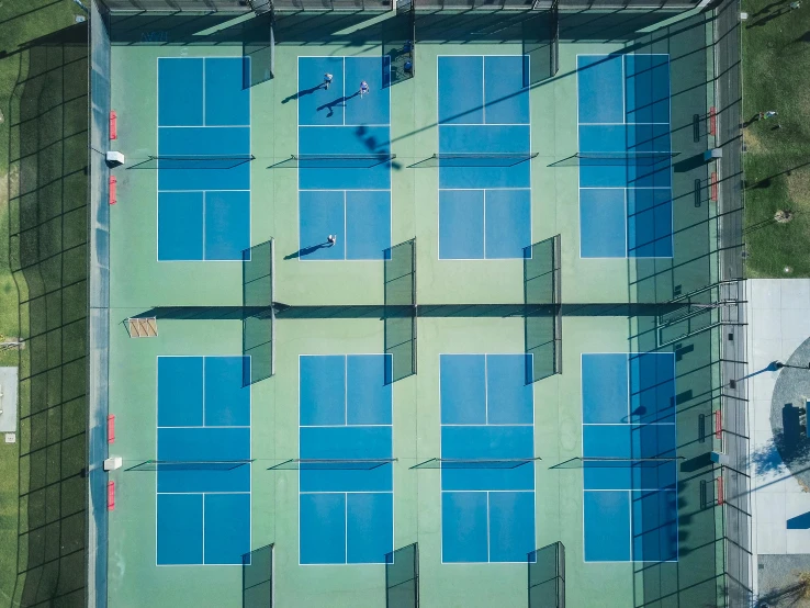 a group of people standing on top of a tennis court, by Jan Rustem, unsplash contest winner, bauhaus, an aerial tennis court, light blues, square, 15081959 21121991 01012000 4k