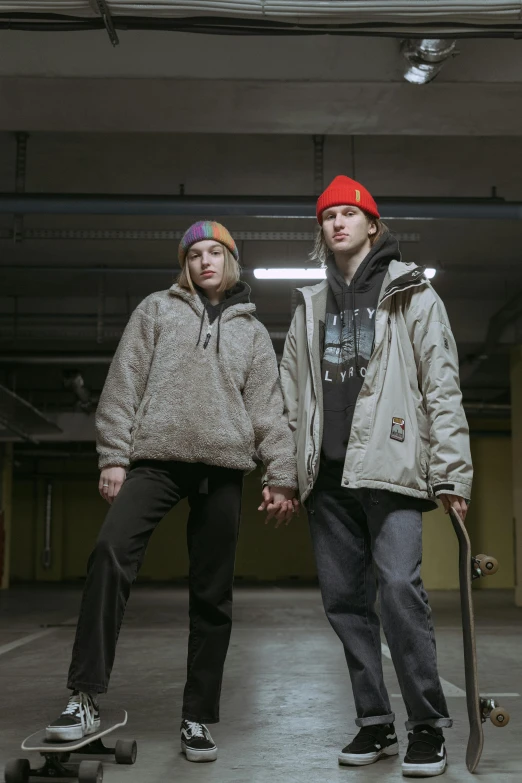 a couple of men standing next to each other with skateboards, a portrait, unsplash, antipodeans, wearing beanie, russian clothes, e - girl, halo / nimbus