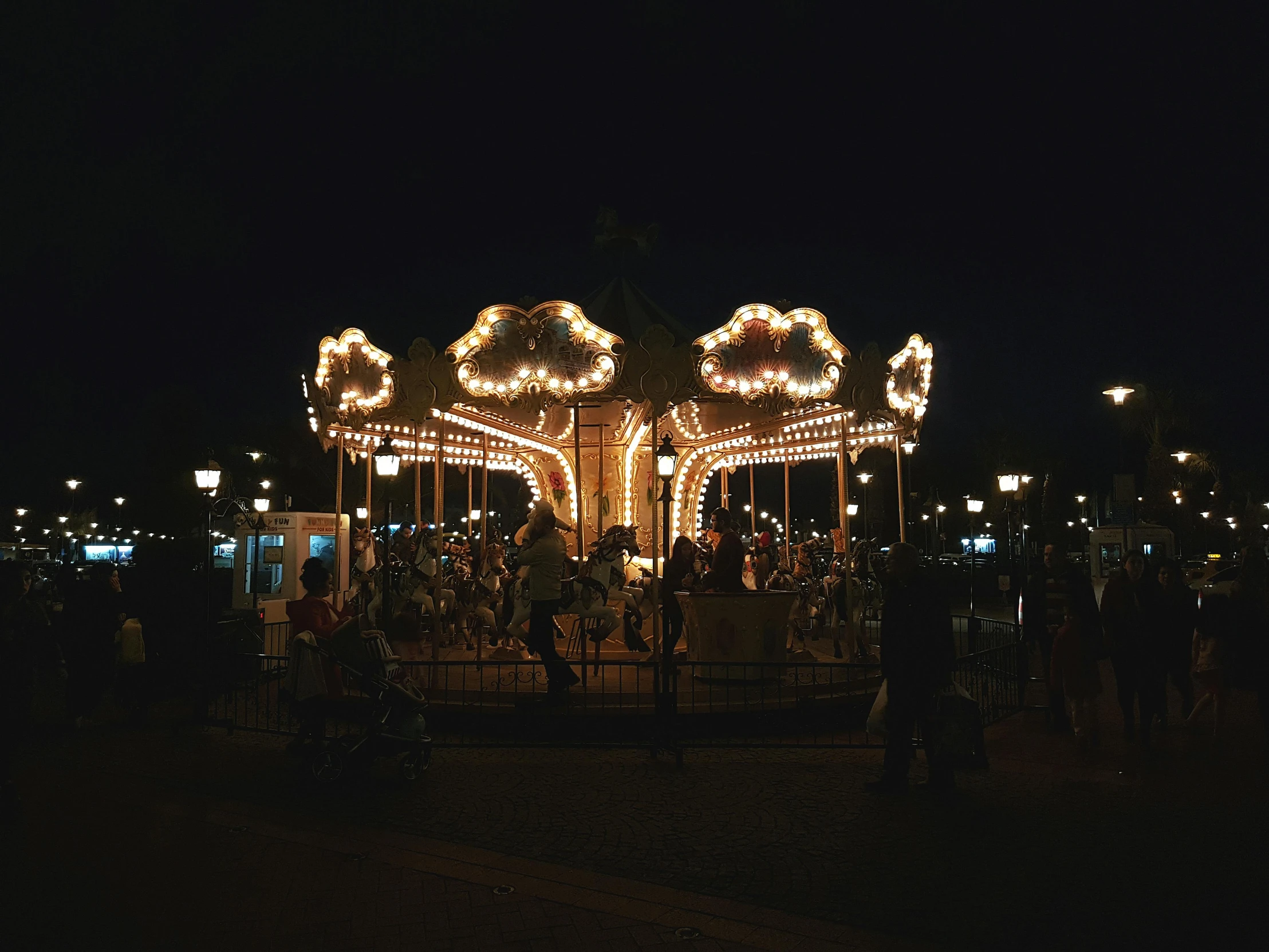 a merry merry merry merry merry merry merry merry merry merry merry merry merry merry merry merry merry, a picture, by Ryan Pancoast, pexels contest winner, magical realism, an amusement park in old egypt, night time low light, trying to ride it, magic kingdom