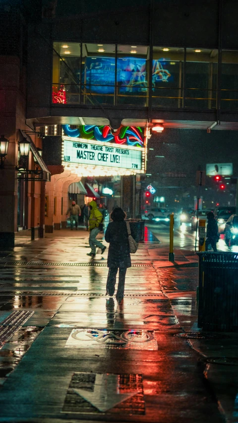 a person walking in the rain with an umbrella, by Dennis Flanders, neon lights outside, cinestill eastmancolor, trending photo, memphis