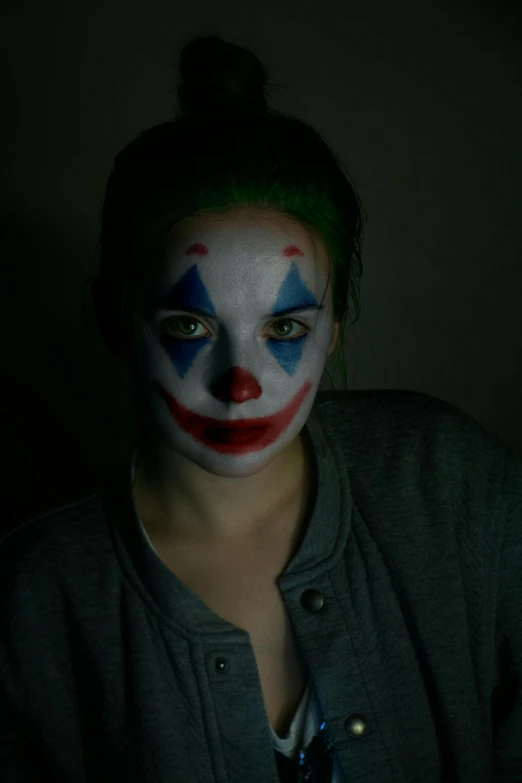 a woman with her face painted like a clown, reddit, antipodeans, low light cinematic, the joker, low quality photo, circle