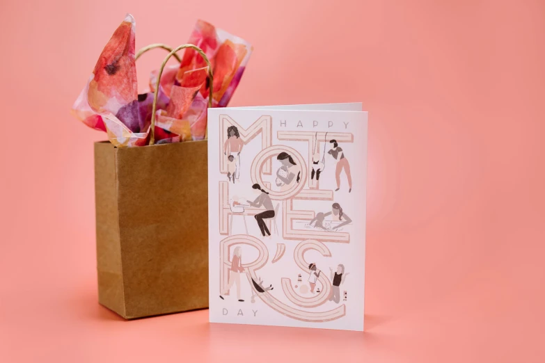 a card sitting on top of a brown paper bag, other women dancing behind, pink, greeting card, holster