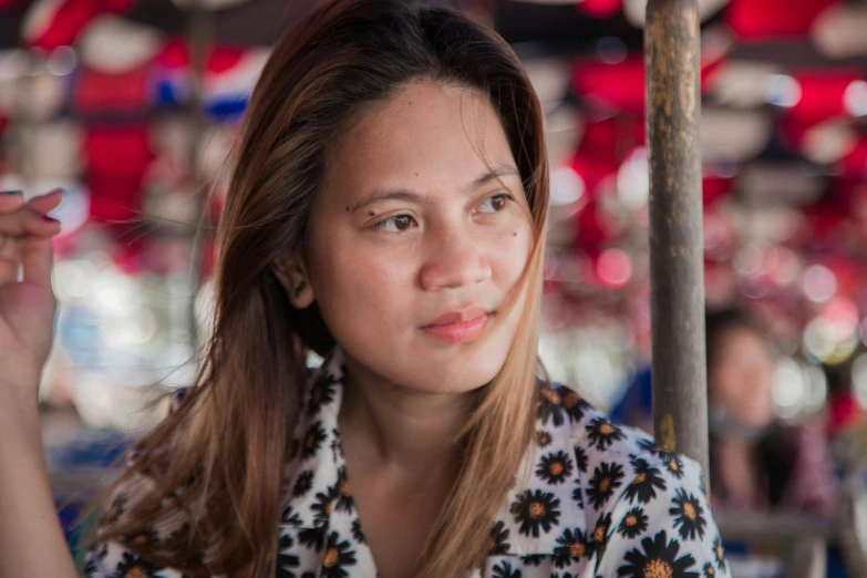 a woman sitting at a table with a fork in her hand, a portrait, inspired by Ruth Jên, pexels contest winner, south east asian with round face, avatar image, tourist photo, closeup headshot portrait