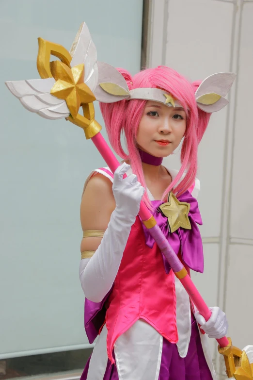 a woman in a cosplay costume holding a sword, inspired by Sailor Moon, ((pink)), star guardian inspired, square, usa