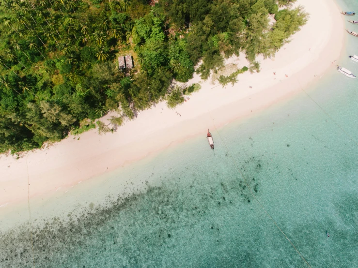 an aerial view of a beach in the middle of the ocean, pexels contest winner, hurufiyya, in a beachfront environment, white, sam leach, thumbnail