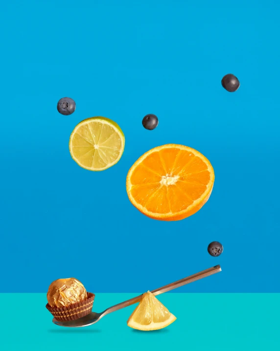 a blue background with oranges, blueberries, and a spoon, behance lemanoosh, candy treatments, thumbnail, golden ration