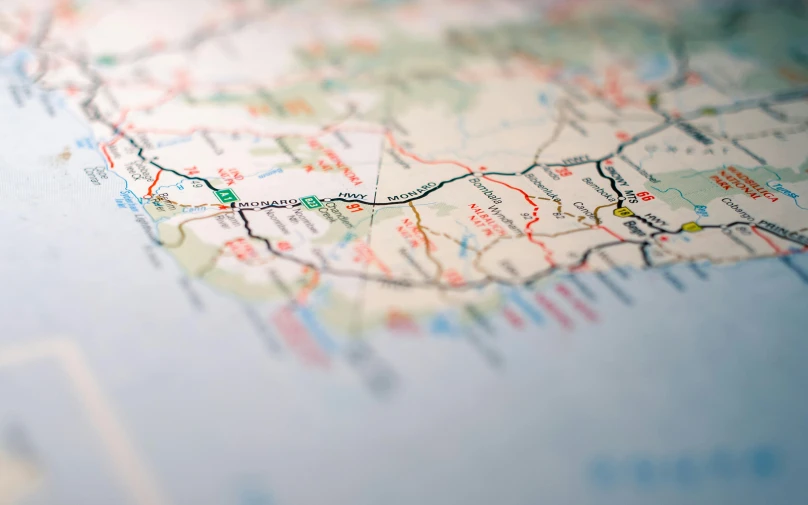 a close up of a map on a table, unsplash, regionalism, cornwall, road, high detailed print, trending photo