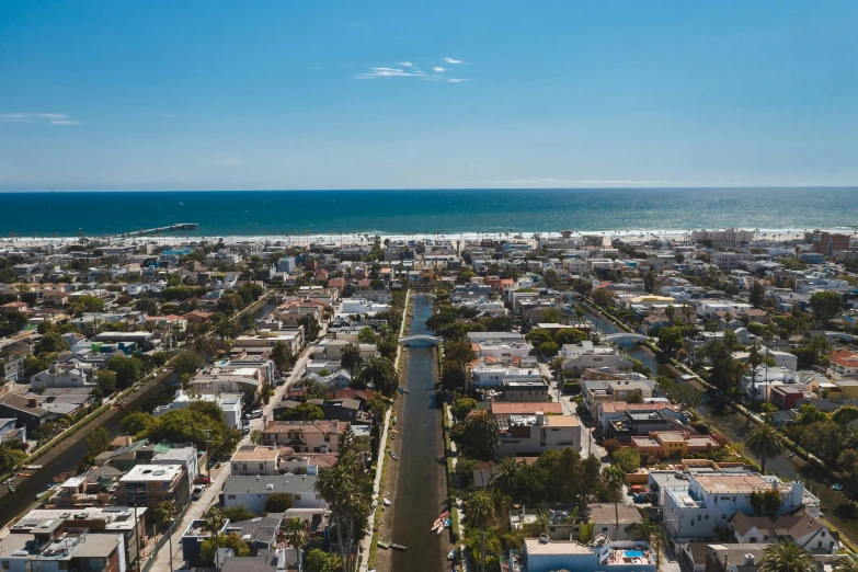 an aerial view of a city next to the ocean, by Ryan Pancoast, the city of santa barbara, canals, profile image, ultrawide lens”