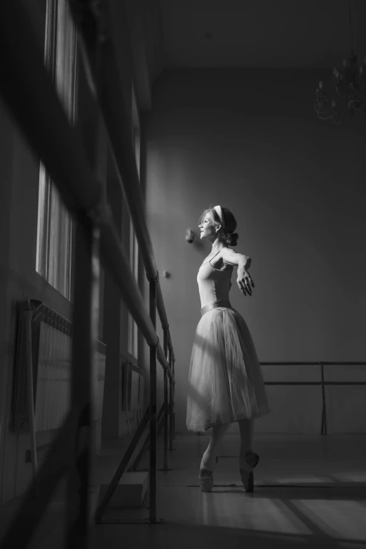 a black and white photo of a ballerina, featured on cgsociety, square, looking outside, predawn, vivid)