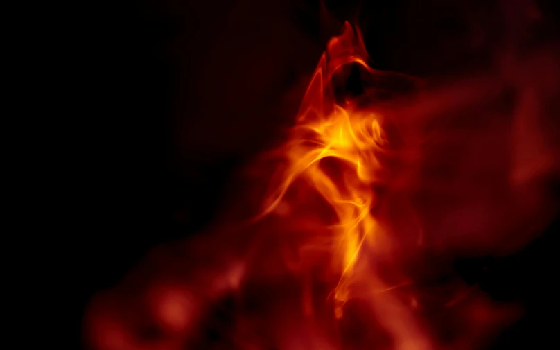 a close up of a fire in the dark, an album cover, inspired by Anna Füssli, pexels, digital art, in volumetric soft glowing mist, fire red, tiny firespitter, human torch