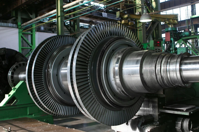 a close up of a machine in a factory, by Edwin Georgi, turbines, a pair of ribbed, ultra - quality, steel mill