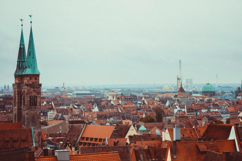 a view of a city from the top of a building, by Daniel Lieske, pexels contest winner, renaissance, nuremberg, vintage color, 🦩🪐🐞👩🏻🦳, banner