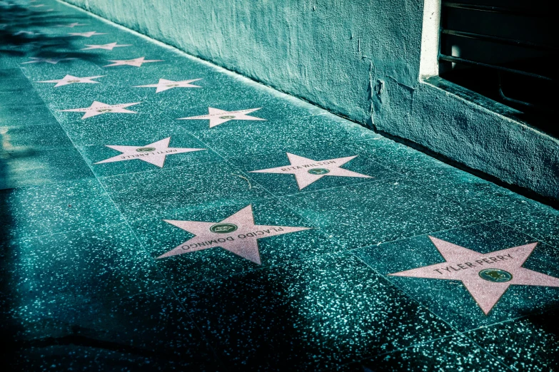 hollywood walk of fame star walk of fame hollywood walk of fame hollywood walk of fame hollywood walk of fame hollywood walk of fame hollywood walk of fame, a photo, by Julia Pishtar, trending on unsplash, green alley, street of teal stone, youtube thumbnail, glittering stars scattered about