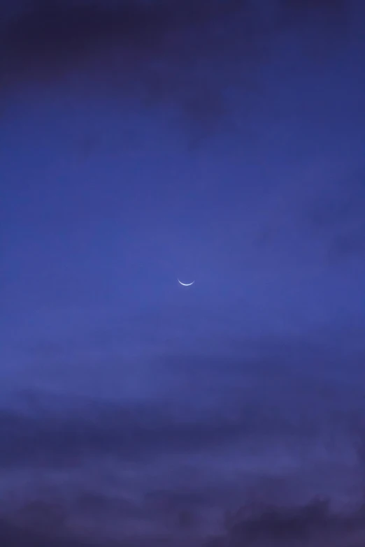 an airplane flying in the sky with the moon in the background, a picture, inspired by Jan Rustem, unsplash, hurufiyya, smiling, crescent moon, indigo, rectangle