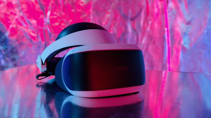 a pair of virtual glasses sitting on top of a table, brightly lit pink room, playstation, tech helmet, thumbnail