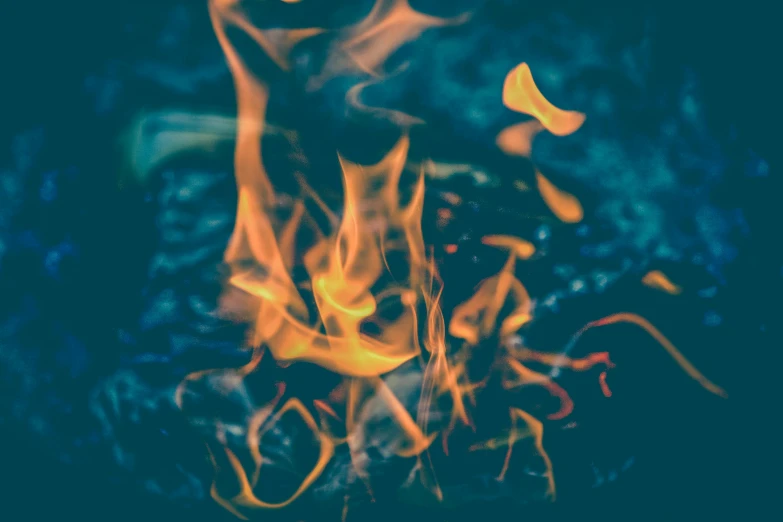 a close up of a fire with flames coming out of it, pexels contest winner, vintage color, avatar image, background image, iphone wallpaper