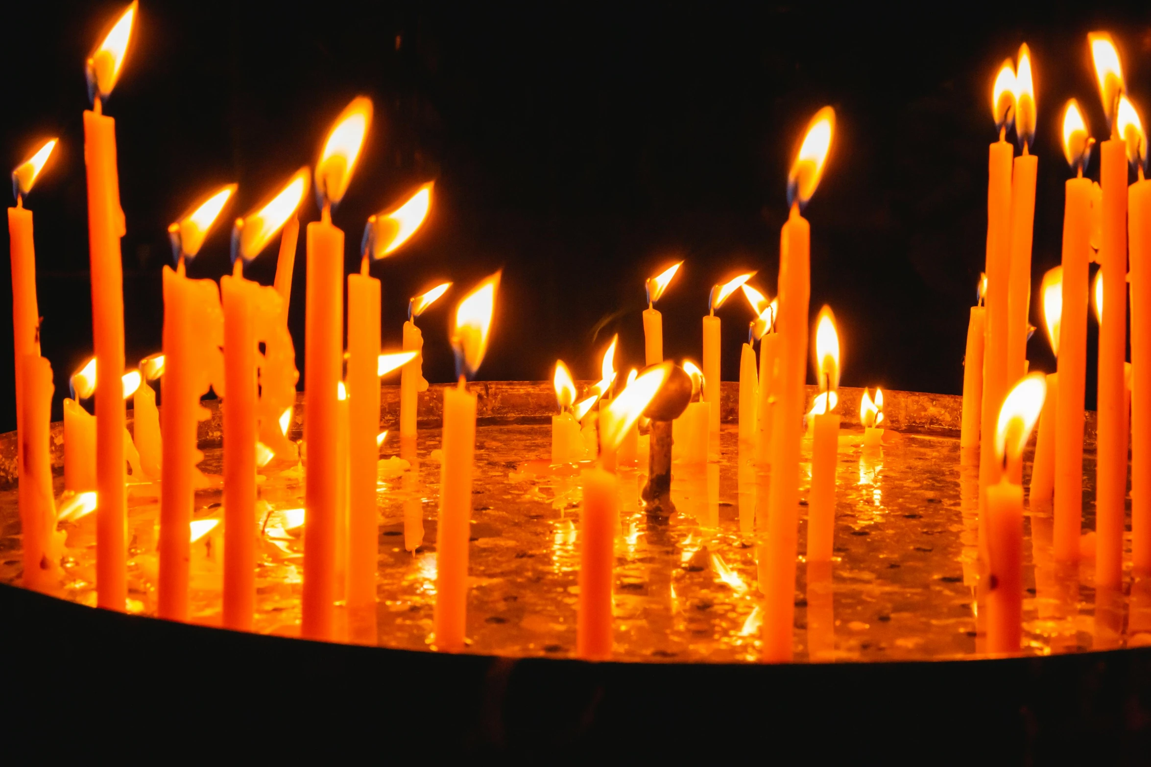 a group of lit candles sitting on top of a table, profile image, orthodoxy, fan favorite, enhanced photo