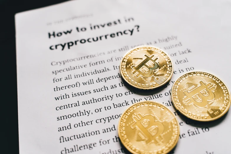 three gold coins sitting on top of a piece of paper, unsplash, hurufiyya, cryptopunk with pit vipers, background image, instagram post, crisp image