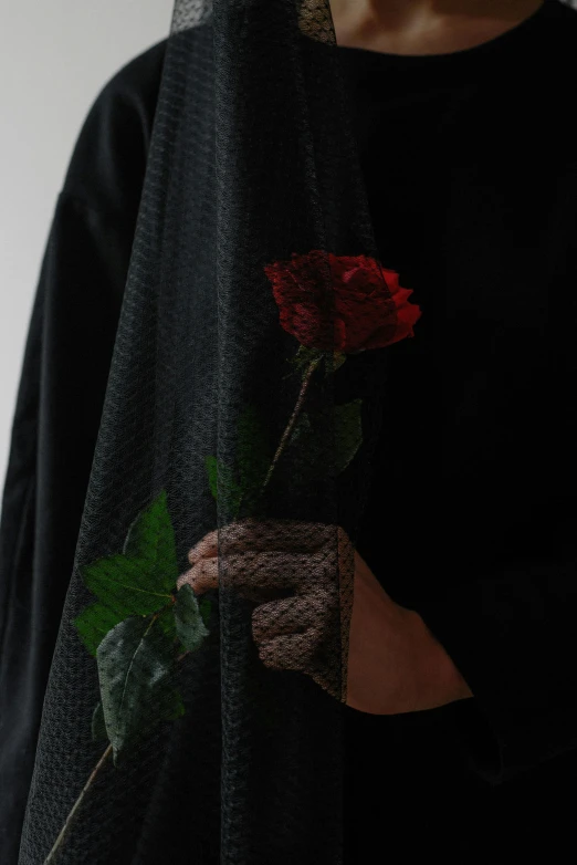 a woman wearing a veil and holding a rose, an album cover, inspired by Anna Füssli, unsplash, embroidered velvet, sayem reza, ignant, low detail