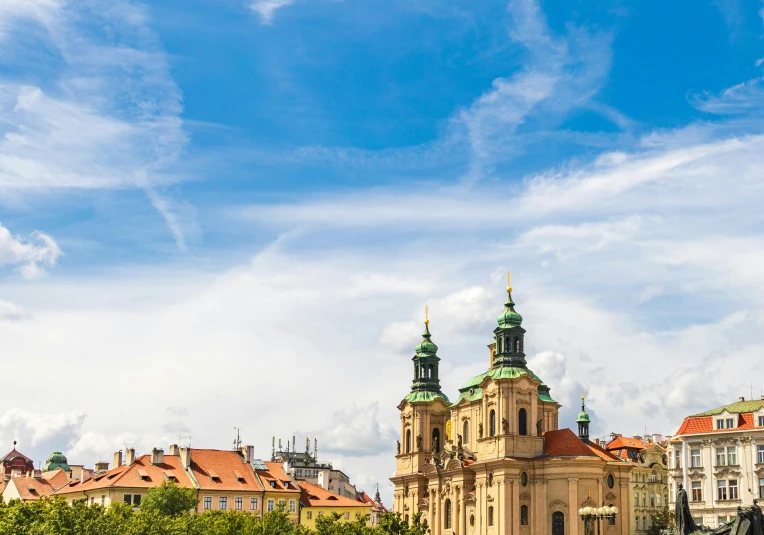 a large building sitting on top of a lush green field, pexels contest winner, baroque, prague in the background, square, blue skies, profile image