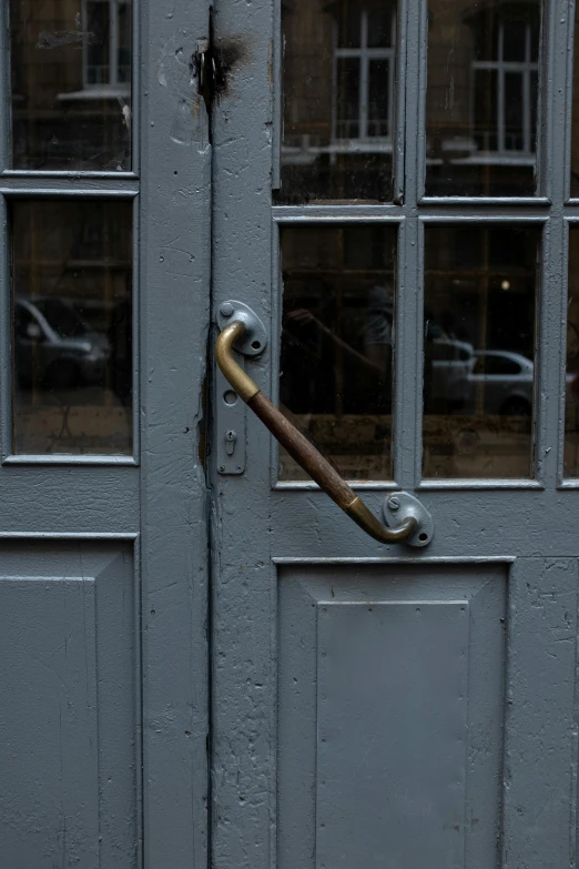 a close up of a door with a handle, by Sven Erixson, unsplash, square, shop front, grey metal body, brass