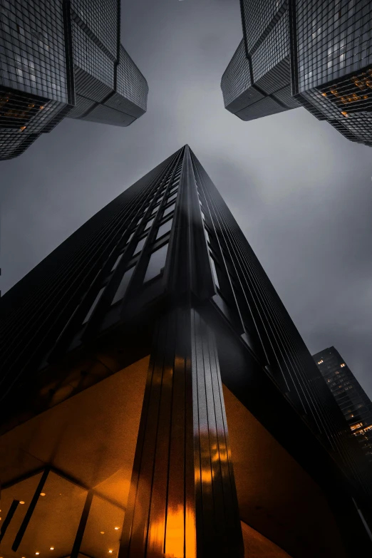 a tall building in the middle of a city at night, an album cover, by Andrew Domachowski, pexels contest winner, modernism, sins inc skyscraper front, black on black, trump tower, . dramatic angle