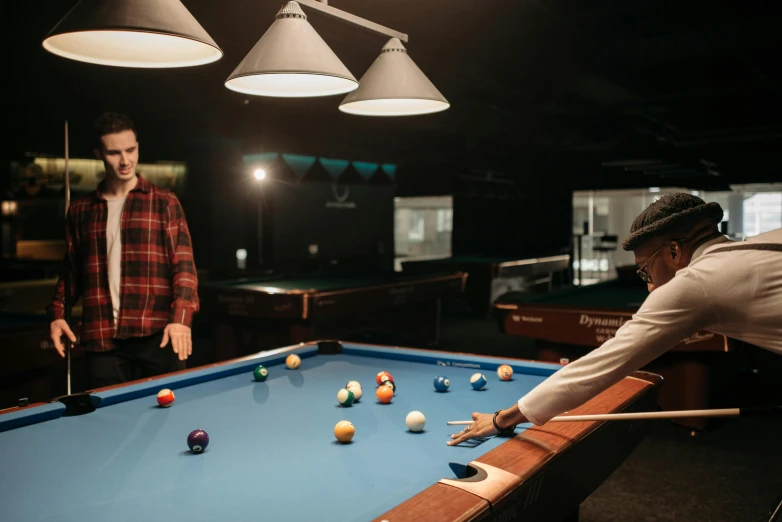 a couple of men playing a game of pool, a portrait, unsplash, interactive art, 15081959 21121991 01012000 4k, lachlan bailey, cinema still, light on top