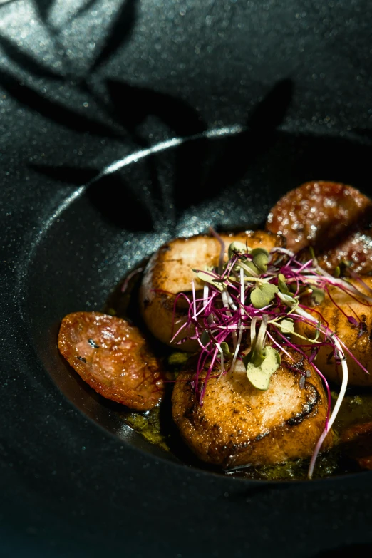 a close up of a plate of food on a table, by Tom Bonson, square, krakens, thumbnail, charred