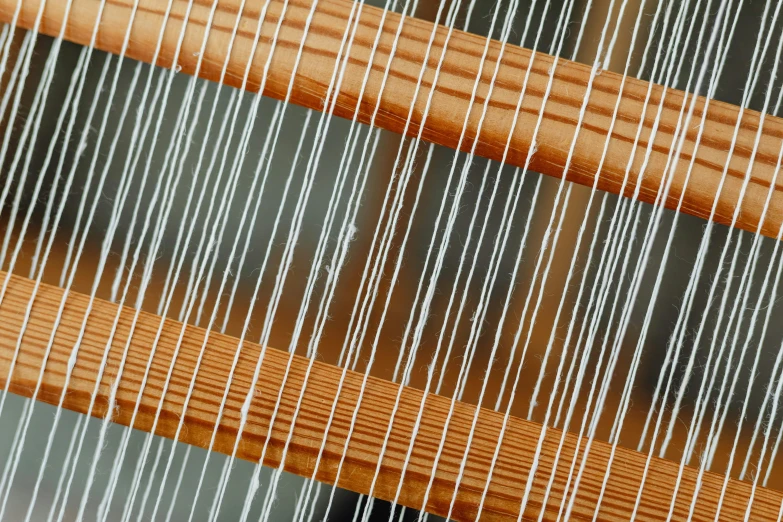 a close up of a close up of a weaving machine, inspired by Anni Albers, unsplash, harp, niels otto møller, thumbnail, reeds