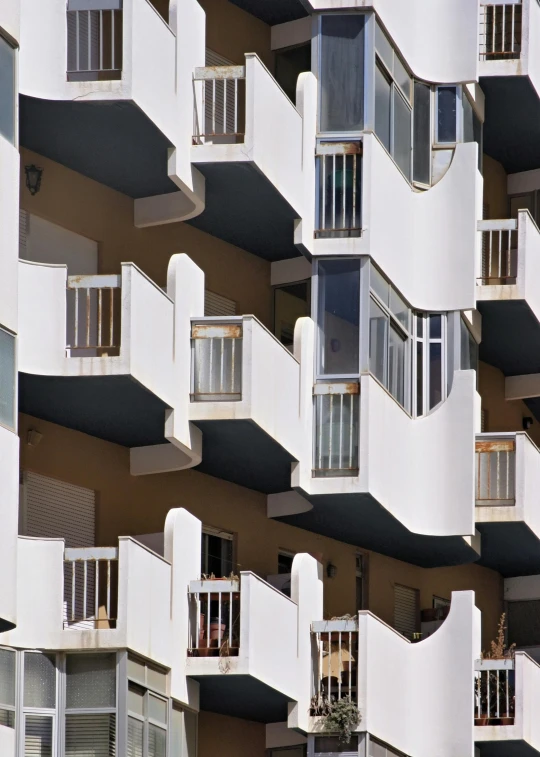 a very tall building with many windows and balconies, inspired by Ricardo Bofill, unsplash, white fractals, balcony door, ibiza, ilustration