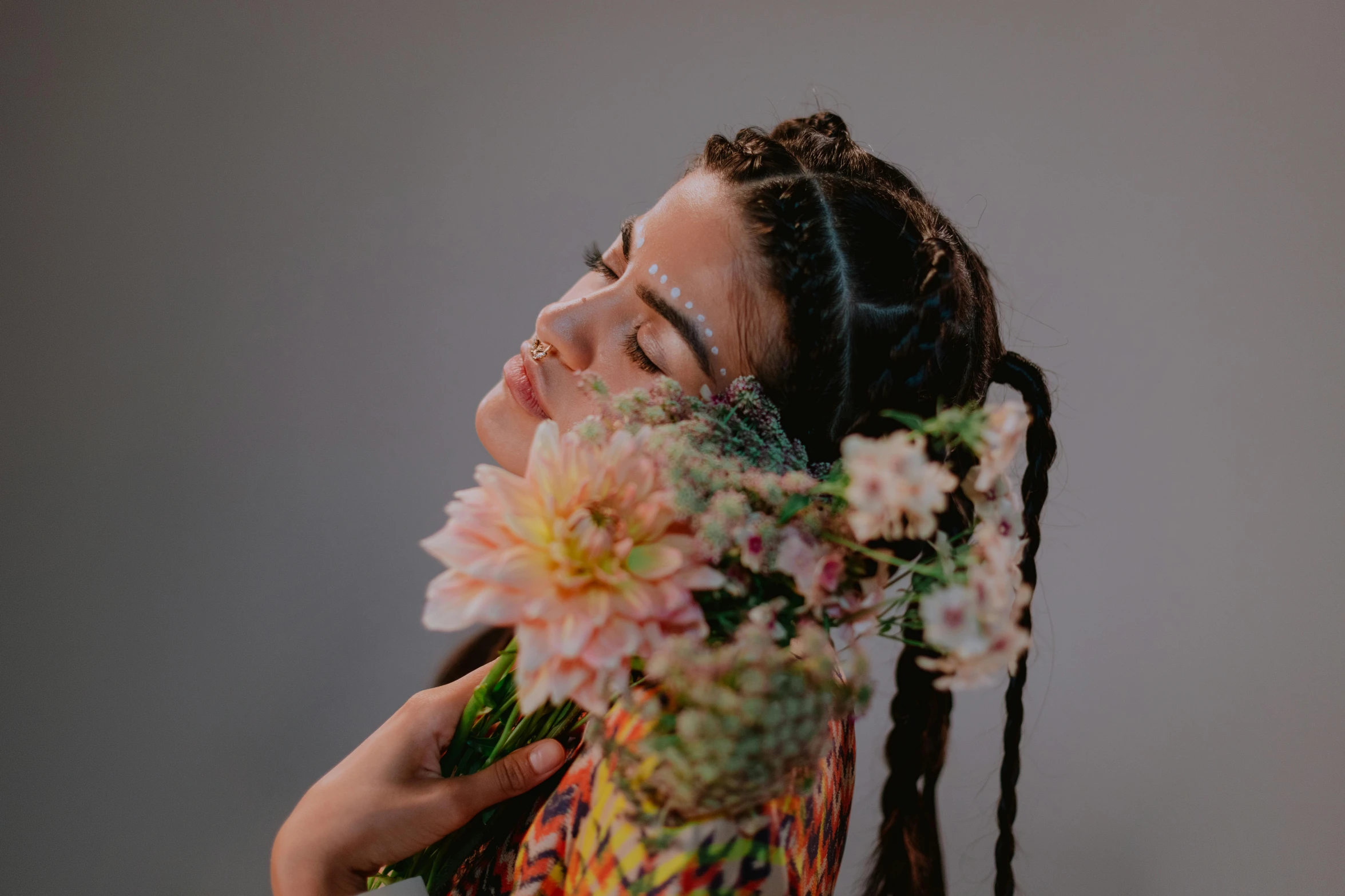 a woman with a flower in her hair, inspired by Kahlo, trending on pexels, black hair in braids, bouquet, charli xcx, icon