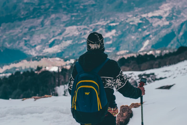 a man riding skis on top of a snow covered slope, pexels contest winner, visual art, a backpack, avatar image, looking sad, overlooking