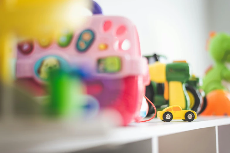 a bunch of toys that are on a shelf, pexels, unfocused, color ( sony a 7 r iv, sunny light, rectangle