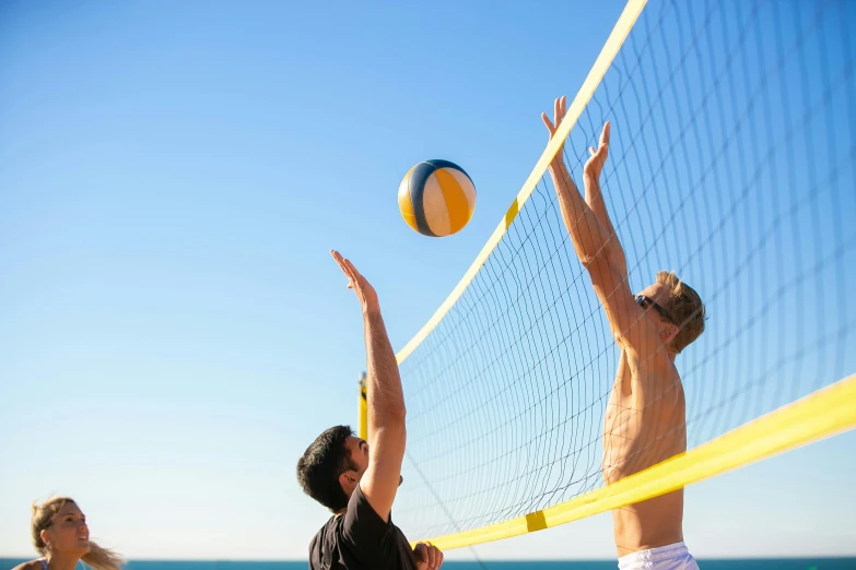 a couple of men playing a game of volleyball, profile image, sunny day time, high quality product image”, multicoloured