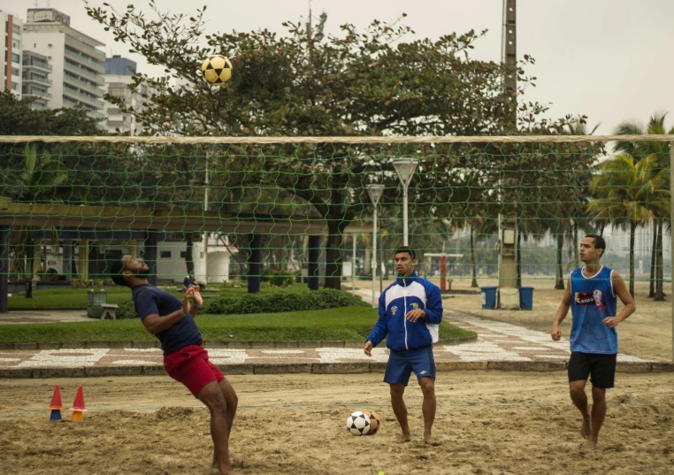 a group of young men playing a game of soccer, by Gina Pellón, unsplash, realism, female beach volley player, square, in sao paulo, complex background