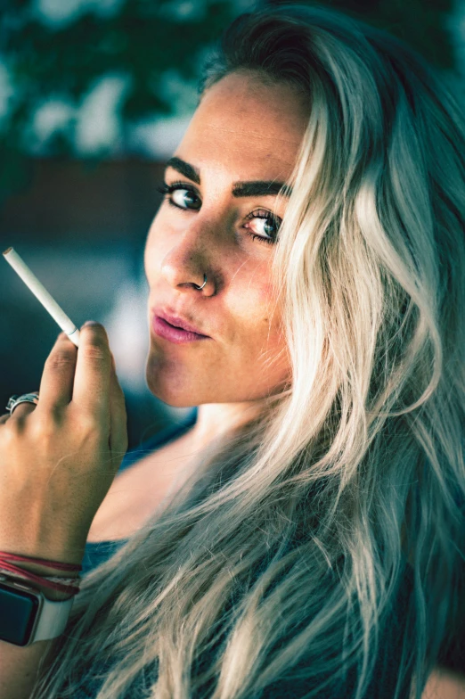 a woman with blonde hair smoking a cigarette, inspired by Elsa Bleda, pexels contest winner, attractive female, overlooking, perfect white haired girl, entheogen