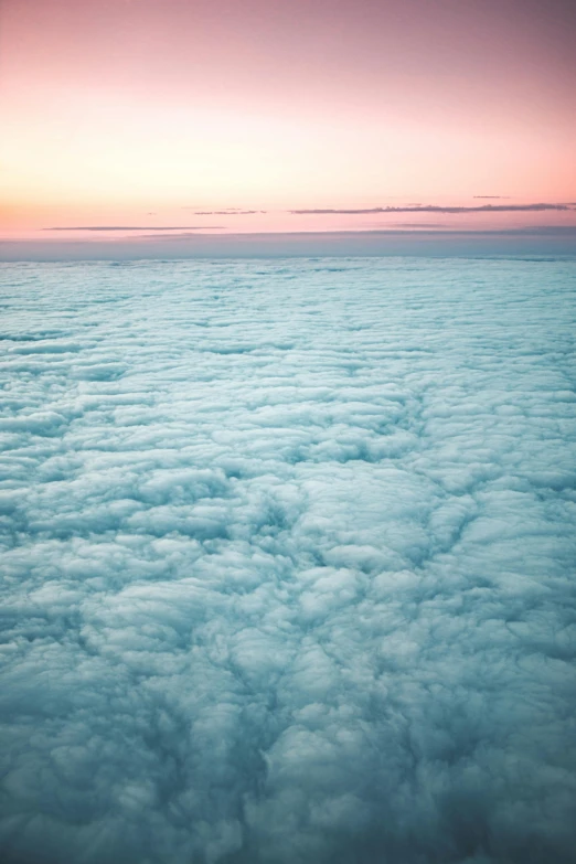 an airplane flying above the clouds at sunset, an album cover, inspired by Elsa Bleda, trending on unsplash, conceptual art, made of cotton candy, portra 8 0 0 ”