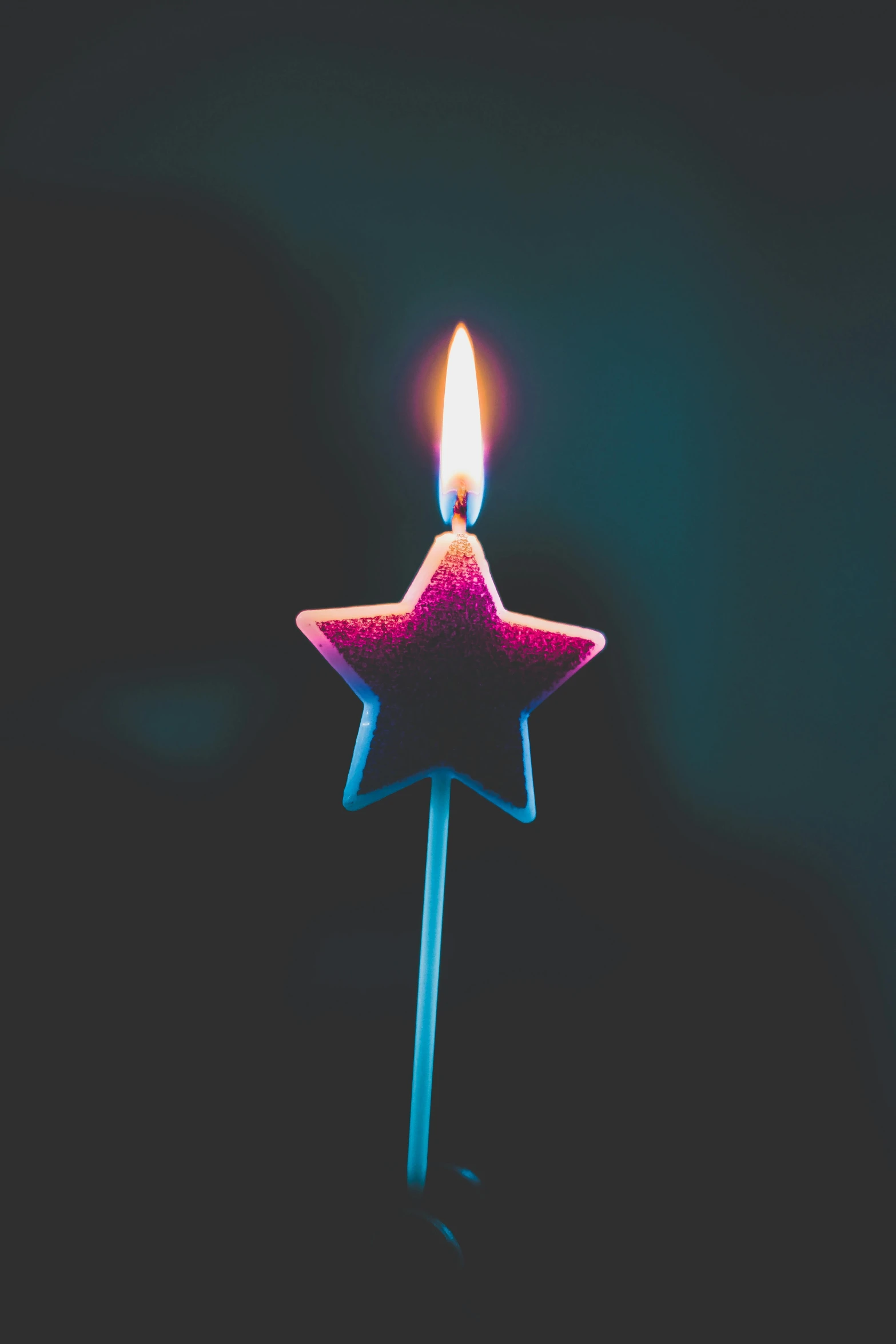 a lit candle in the shape of a star, an album cover, pexels, celebrating a birthday, profile picture, spangle, sports photo