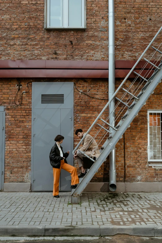 a couple of people that are standing in front of a building, ladder, dressed in 1970s menswear, egor letov, alleys