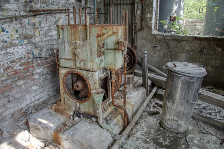 an old stove sitting next to a trash can, by Petr Brandl, pexels contest winner, auto-destructive art, in a massive cavernous iron city, complex machinery, small chamber. hyperrealistic, mill