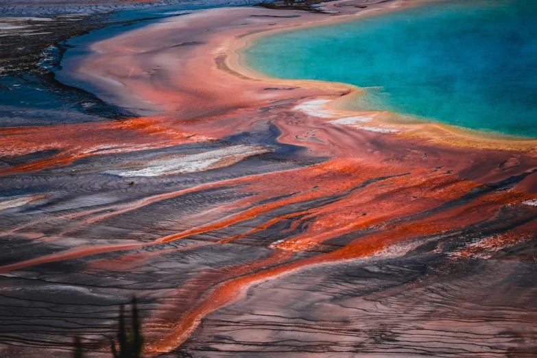 an aerial view of the grand prism geyse geyse geyse geyse geyse geyse geyse geyse geyse geyse ge, a microscopic photo, unsplash contest winner, orange and turquoise, pink water in a large bath, sand swirling, colors reflecting on lake