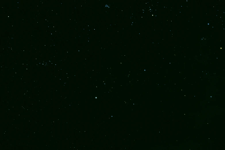 a man riding a snowboard on top of a snow covered slope, an album cover, by Attila Meszlenyi, hurufiyya, night covered in stars, 2 5 6 x 2 5 6, very tiny, night cam footage