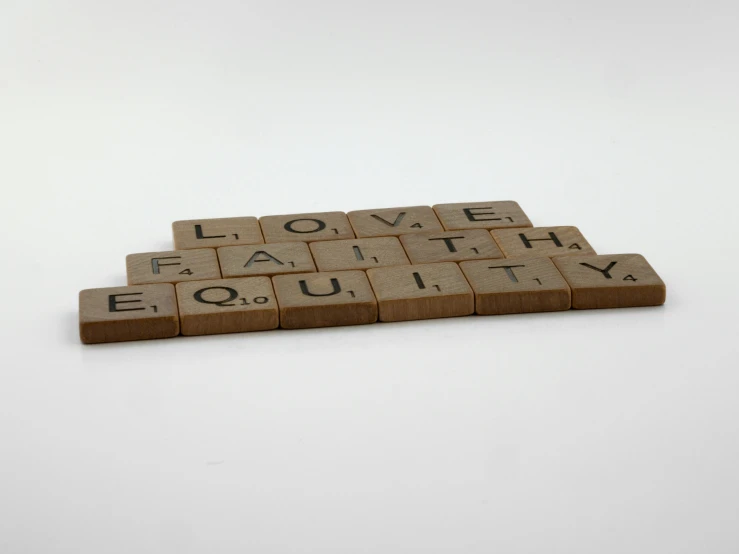 wooden scrabbles spelling love, faith, and equity, inspired by Ian Hamilton Finlay, vintage - w 1 0 2 4, medium level shot, thumbnail, 9
