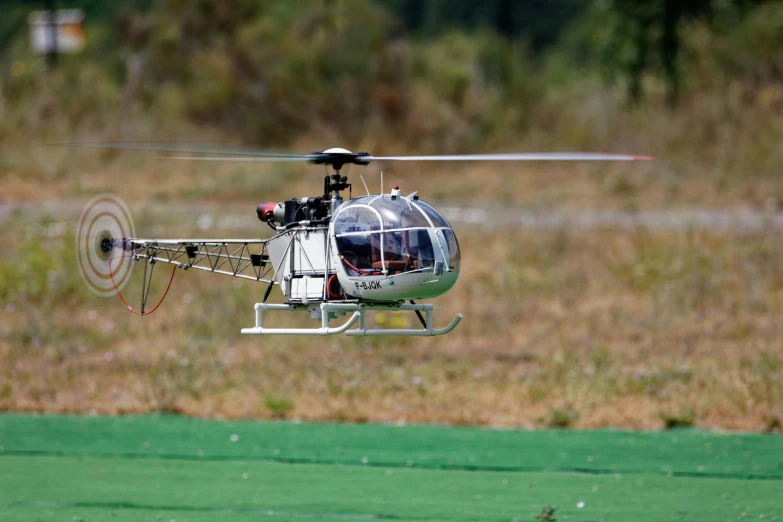 a helicopter that is flying in the air, figuration libre, softair center landscape, photograph credit: ap, extremely hyperdetailed, taken in the early 2020s