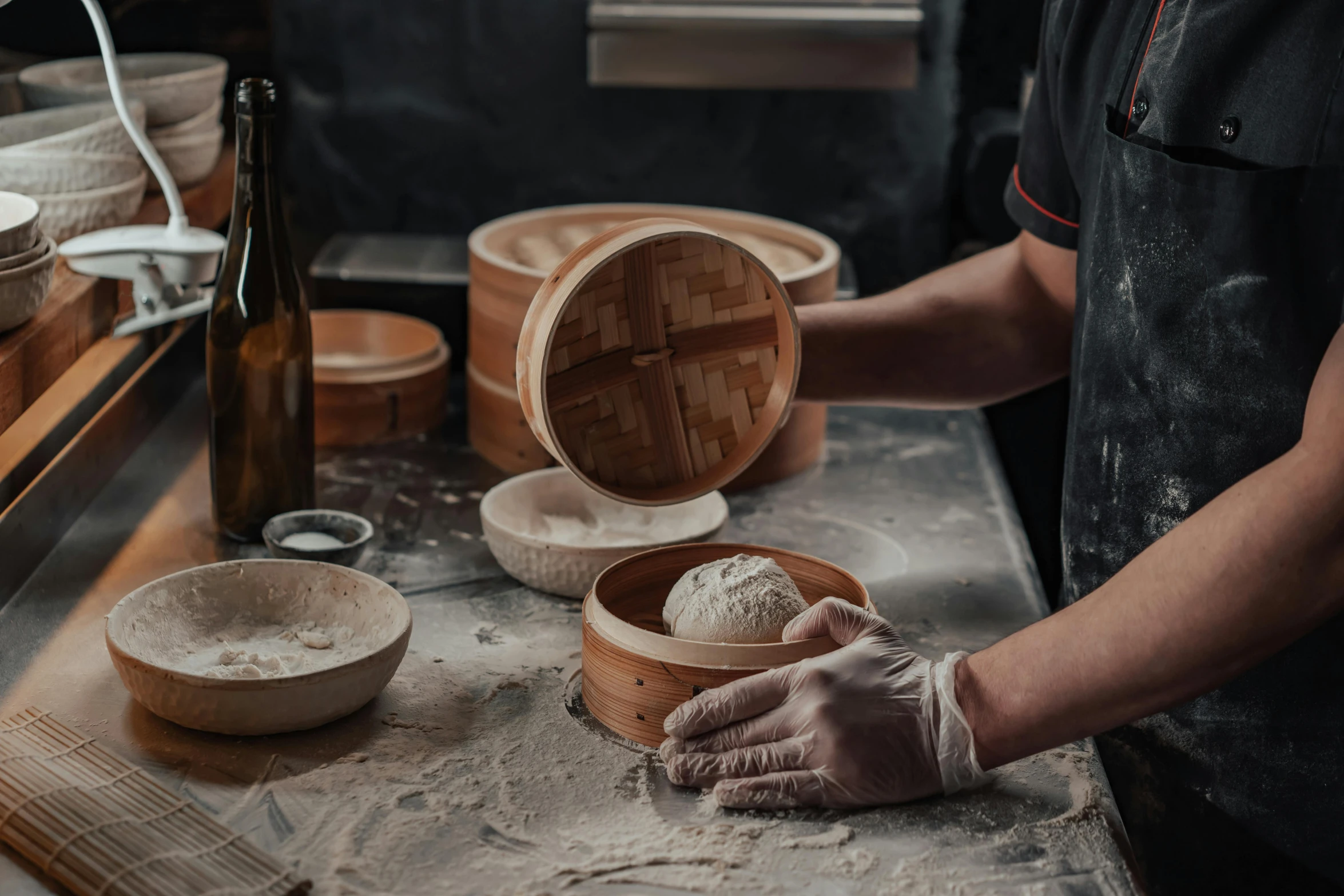 a person in a kitchen preparing food in a bowl, steamed buns, profile image, fan favorite, loaves