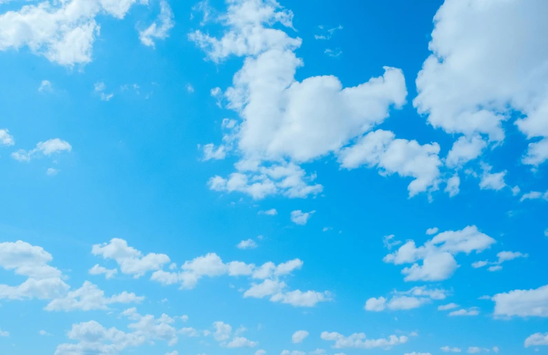 a man flying a kite on top of a lush green field, wispy clouds in a blue sky, slide show, cloudless-crear-sky, today\'s featured photograph 4k